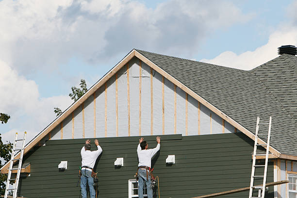 Professional Storm Damage Siding Repair technician working in Gibson Island, MD